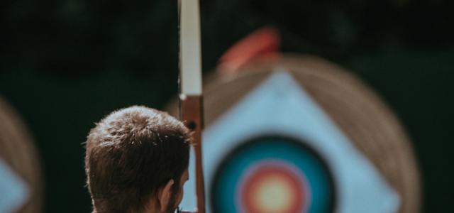 white and brown composite bow by Annie Spratt courtesy of Unsplash.